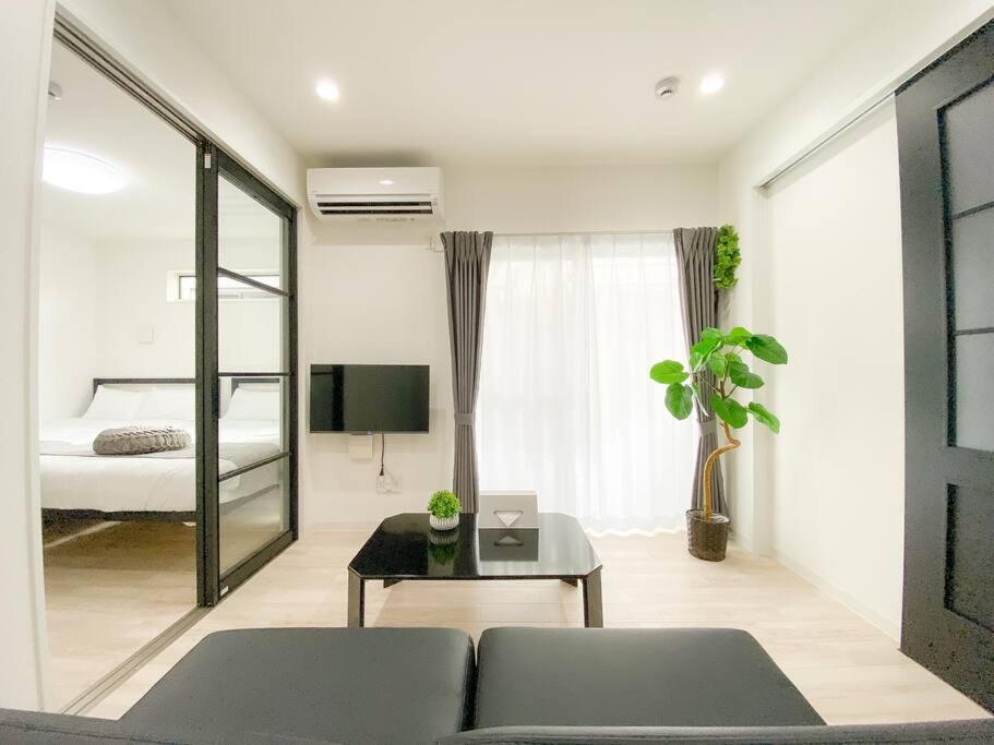 Residential Hotel Glitter Usjまで1駅5分 Osaca Quarto foto