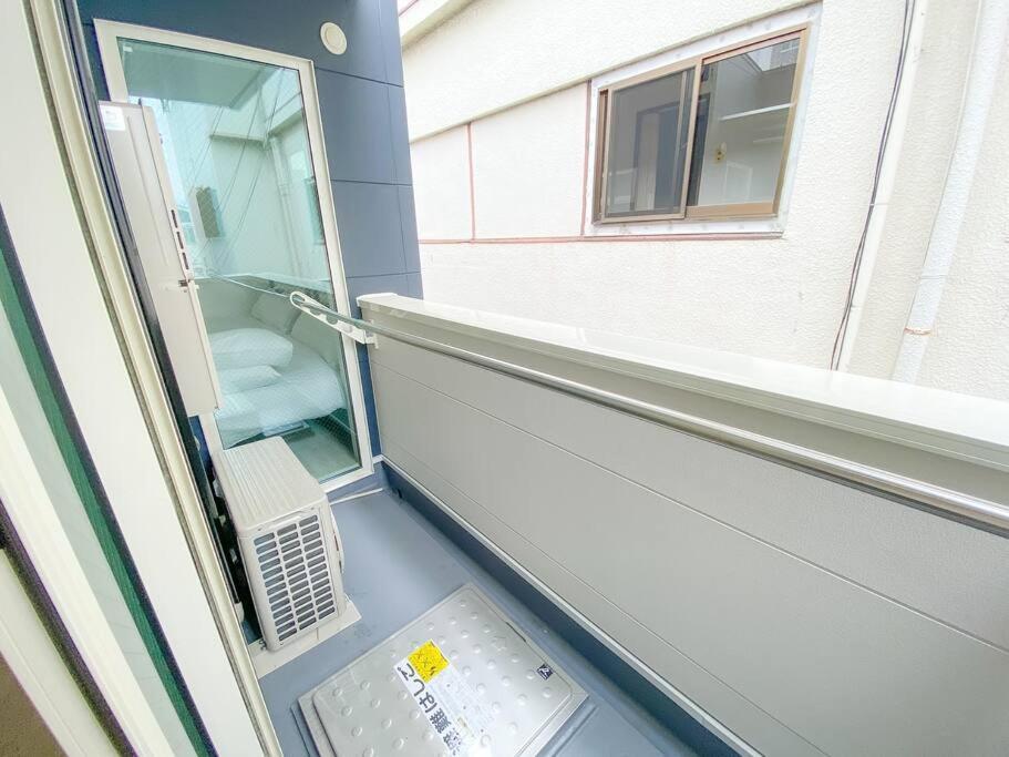 Residential Hotel Glitter Usjまで1駅5分 Osaca Quarto foto