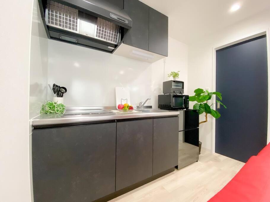 Residential Hotel Glitter Usjまで1駅5分 Osaca Quarto foto