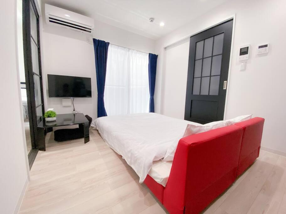 Residential Hotel Glitter Usjまで1駅5分 Osaca Quarto foto