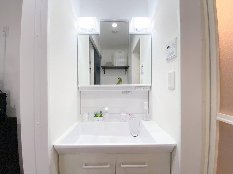 Residential Hotel Glitter Usjまで1駅5分 Osaca Quarto foto