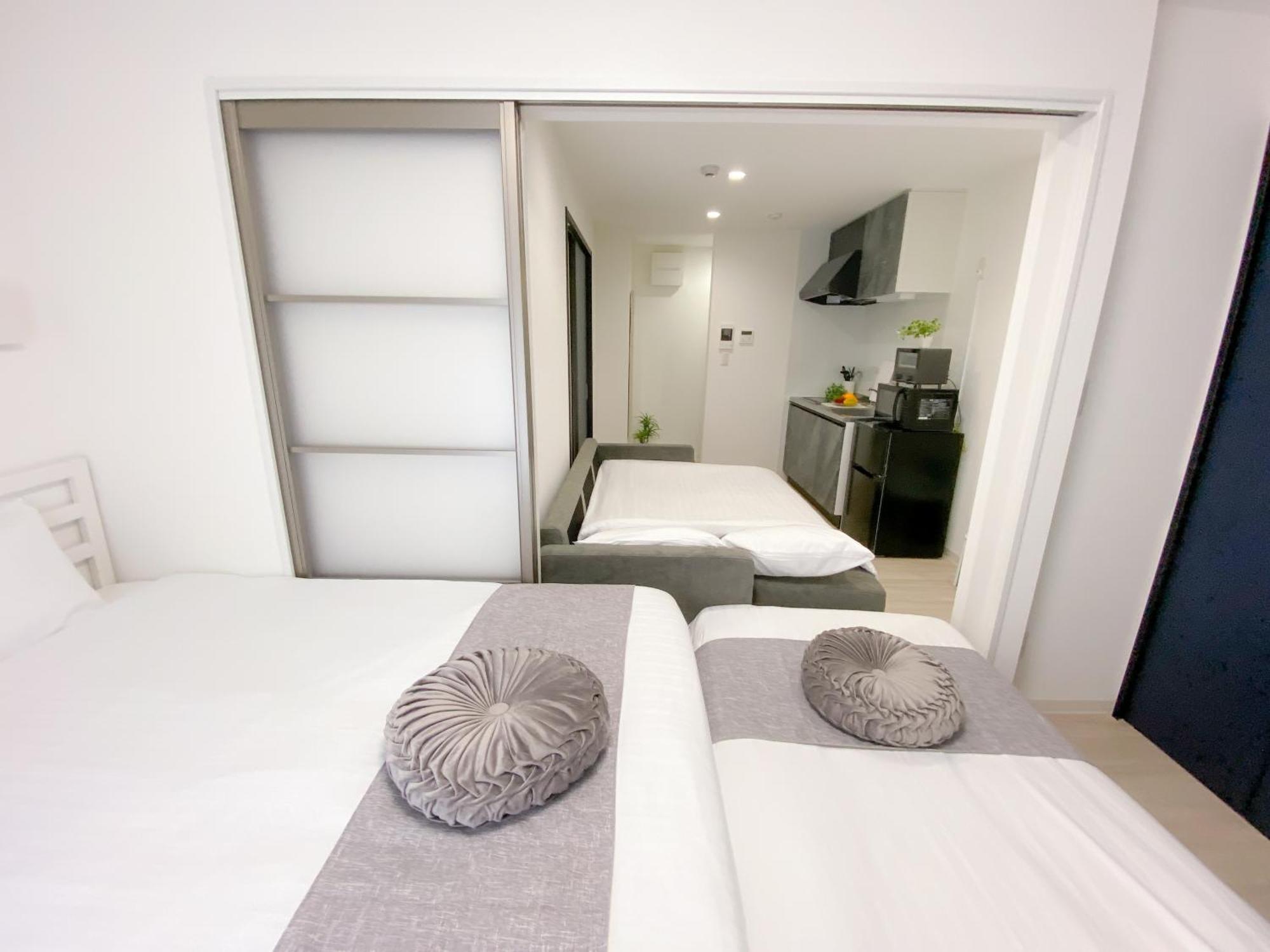 Residential Hotel Glitter Usjまで1駅5分 Osaca Exterior foto