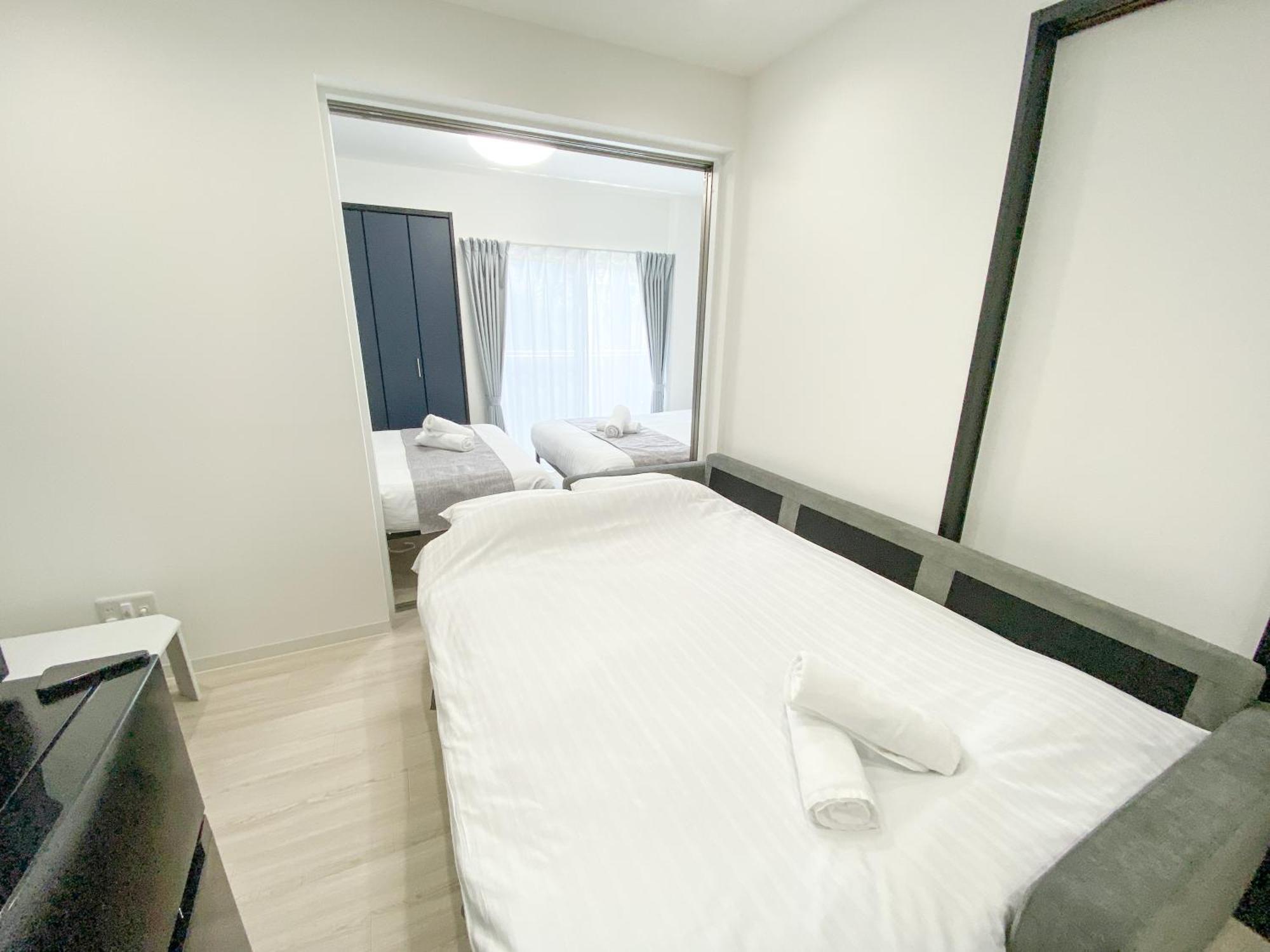 Residential Hotel Glitter Usjまで1駅5分 Osaca Quarto foto